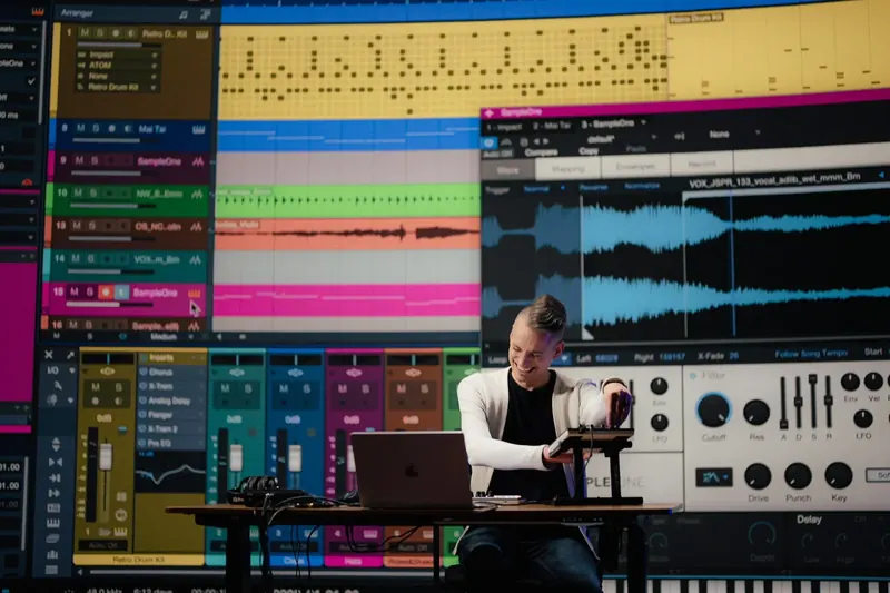 Producer Gregor Beyerle at a desk workstation for the Fender Studio series A Brief Exploration