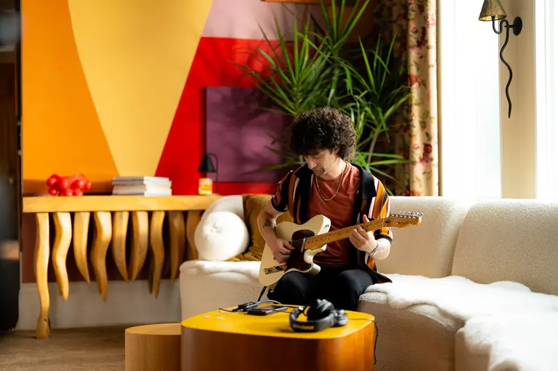 Guitarist Dre Dimura tracking guitar at home for the Fender Studio app launch campaign