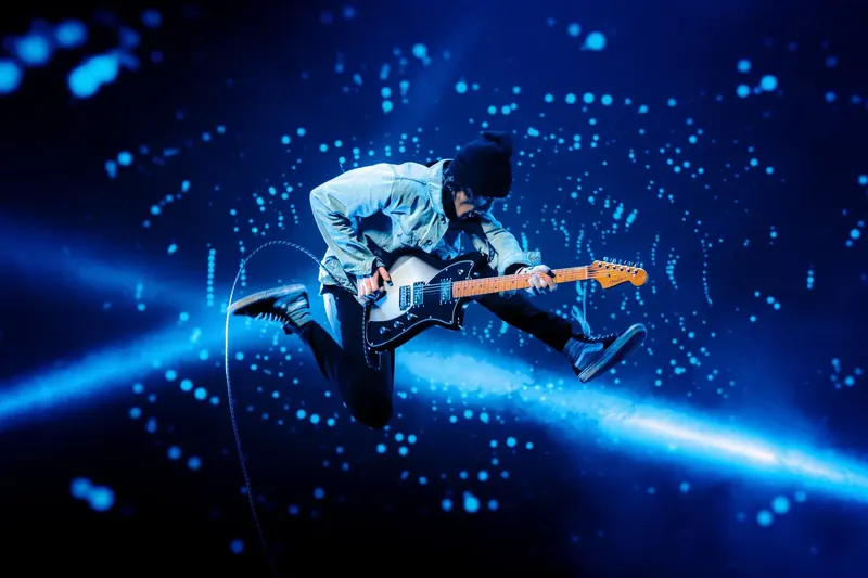 Joey Burcham performing in front of an LED wall for the Studio One 7.2 campaign