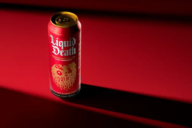 Liquid Death Convicted Melon can spec product shot with dramatic studio lighting