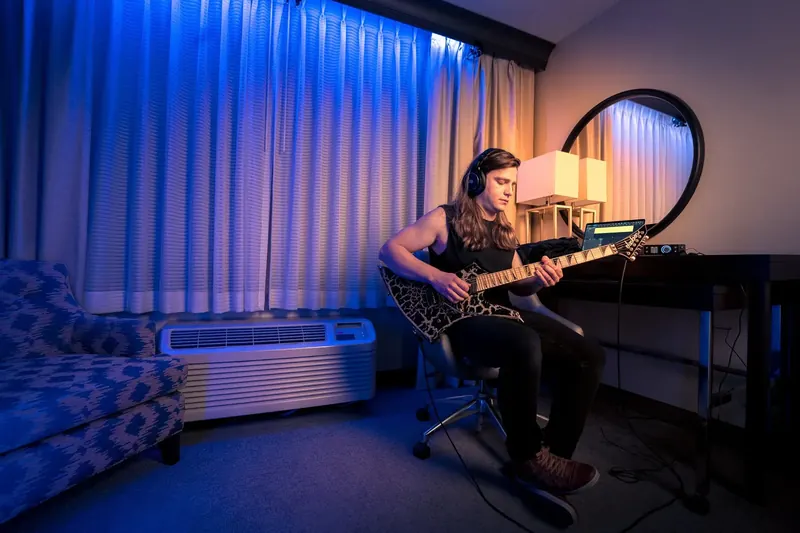 Guitarist Brandon Ellis tracking guitar with a PreSonus Quantum interface
